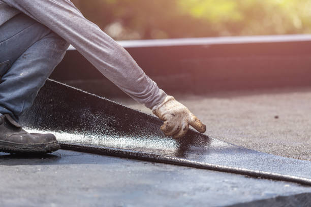 Professional Basement Waterproofing technician working in Perry, OH